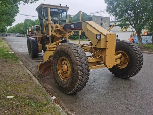 Motoniveladora Caterpillar 14H de color original en excelentes condiciones