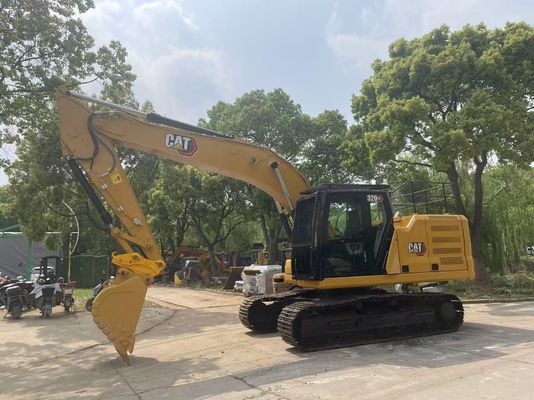 Excavadora Caterpillar 320GC con enganche hidráulico en buen estado