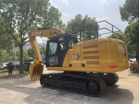 Excavadora Caterpillar 320GC con enganche hidráulico en buen estado