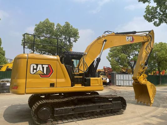 Excavadora Caterpillar 320GC con enganche hidráulico en buen estado